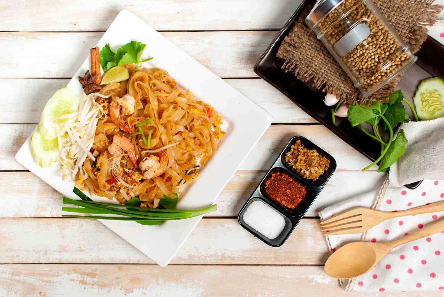 A colourful Thai noodle dish prepared with fresh herbs